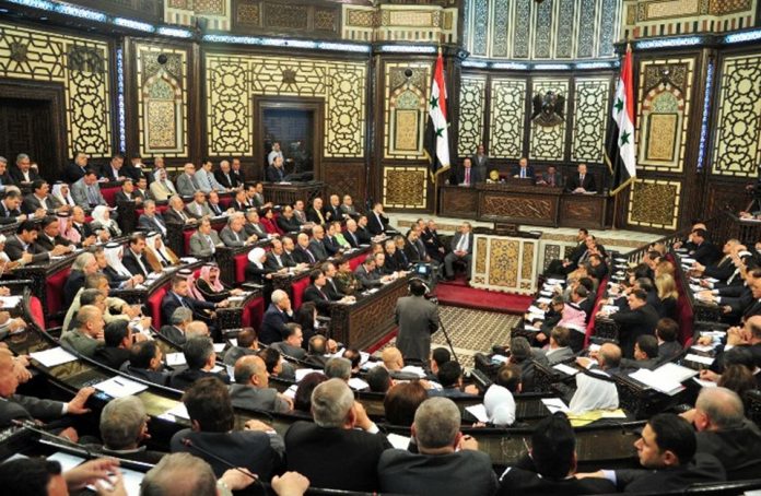 مكافأة للميليشيات الطائفية.. النظام يعدل قانون حق الملكية ويسمح للأجانب تملك المنازل